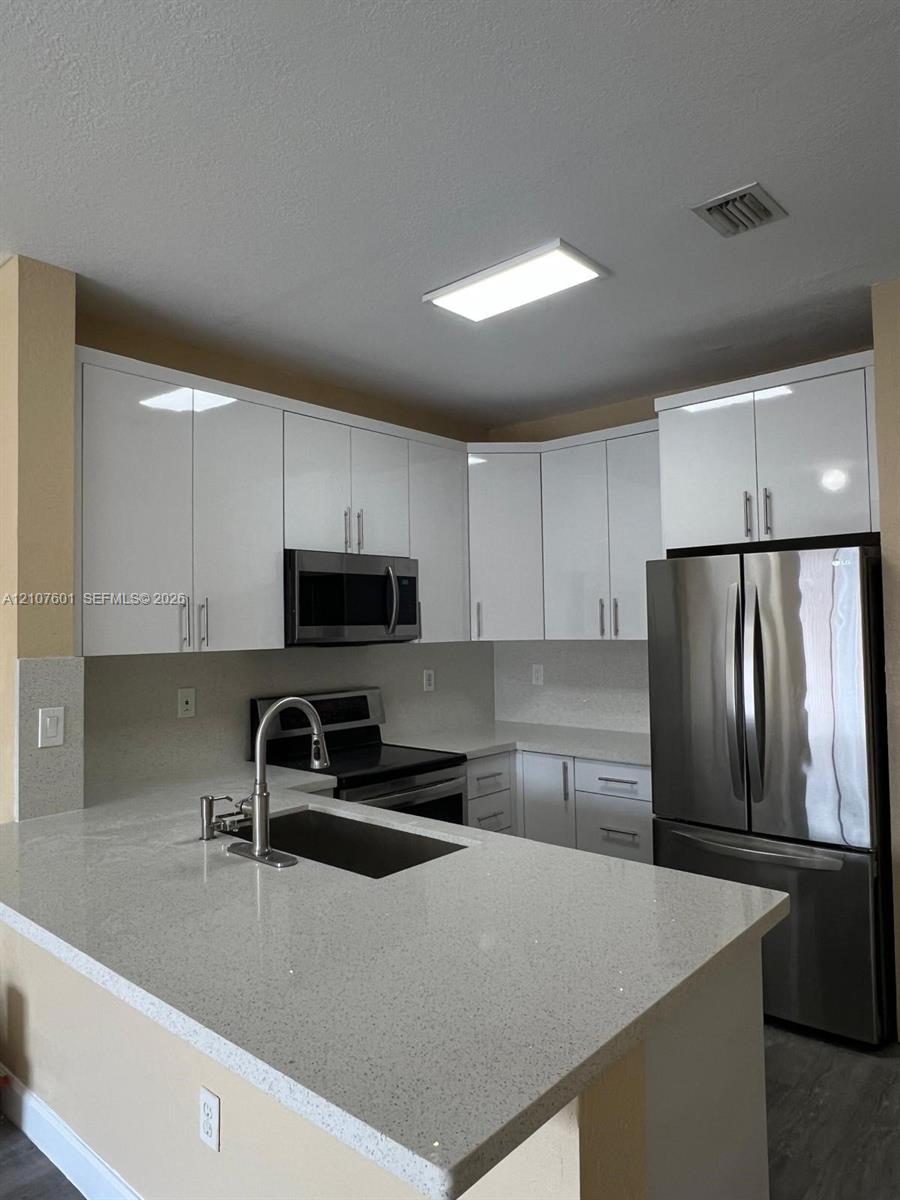 7080 Nw 177th Street 203-13 Property Photo 1