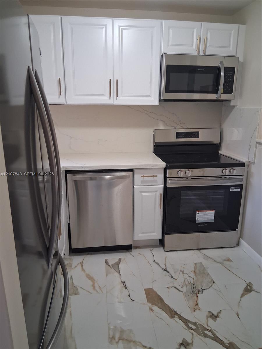 9750 Sunrise Lakes Boulevard 106 Property Photo 1