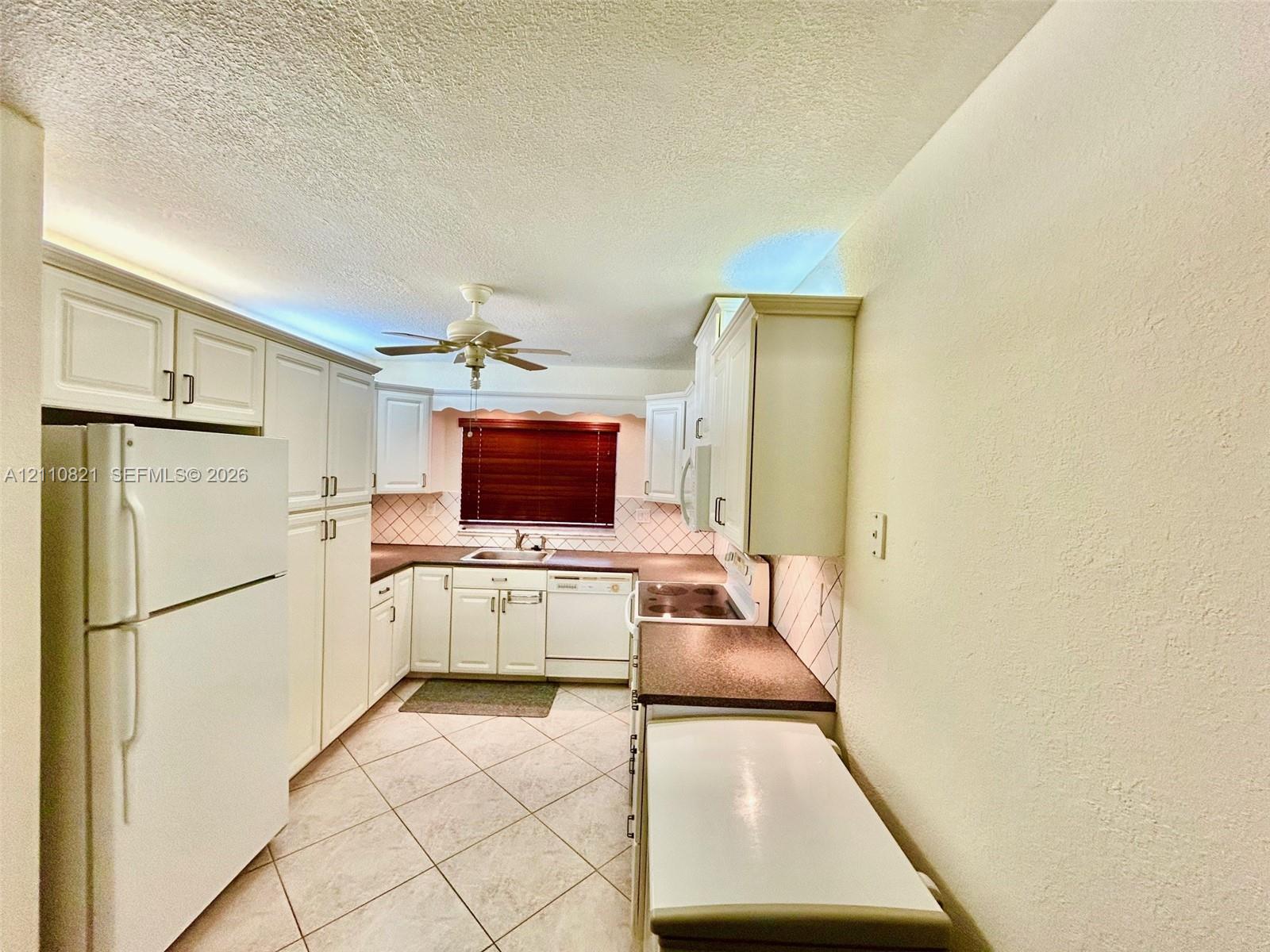 9020 Sunrise Lakes Boulevard 303 Property Photo 1