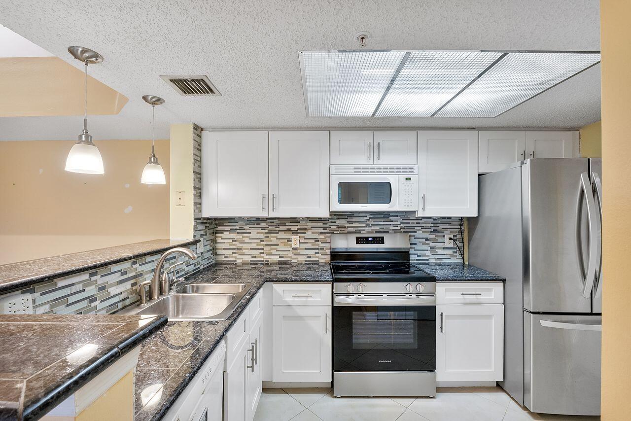 5011 Wiles Road Unit 303 Property Photo 3