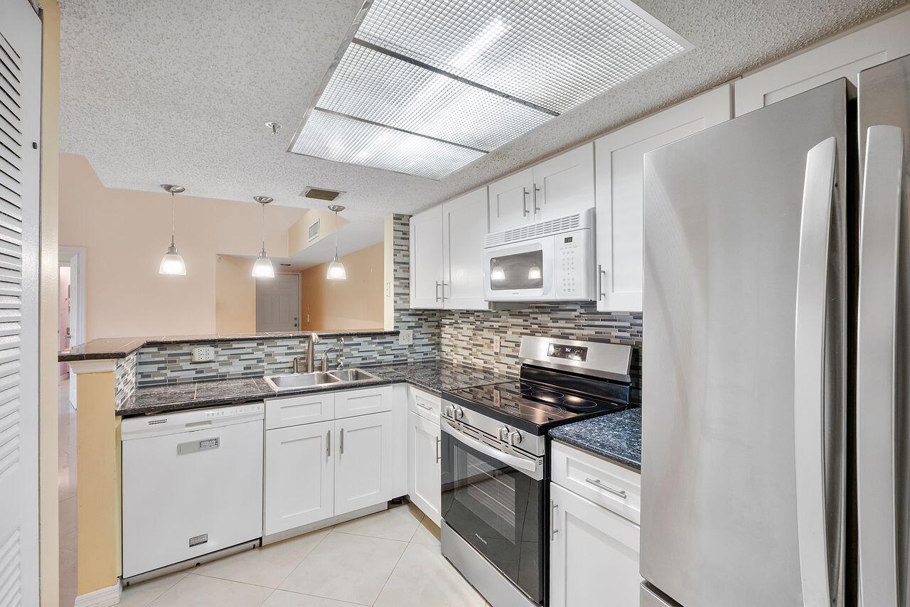 5011 Wiles Road Unit 303 Property Photo 4