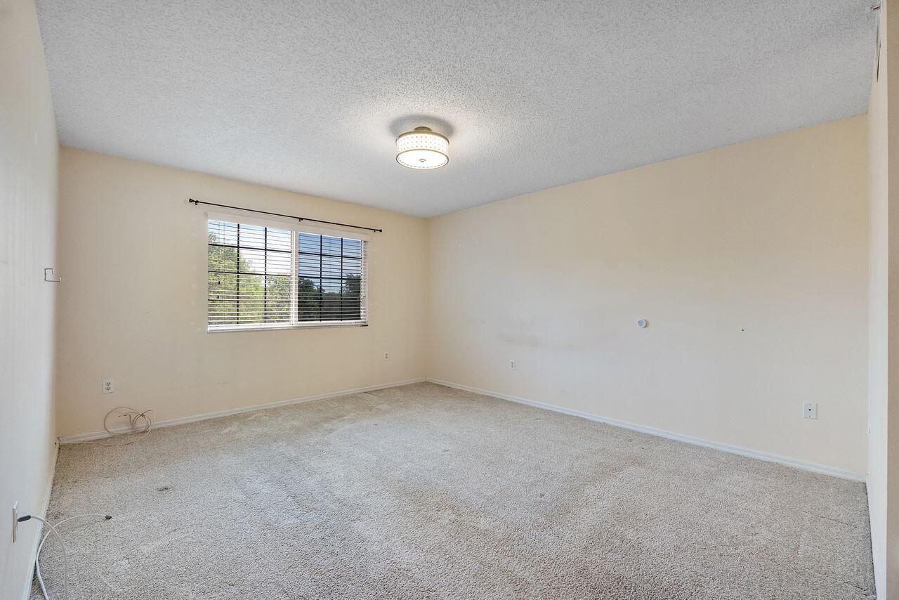 5011 Wiles Road 303 Property Photo 6
