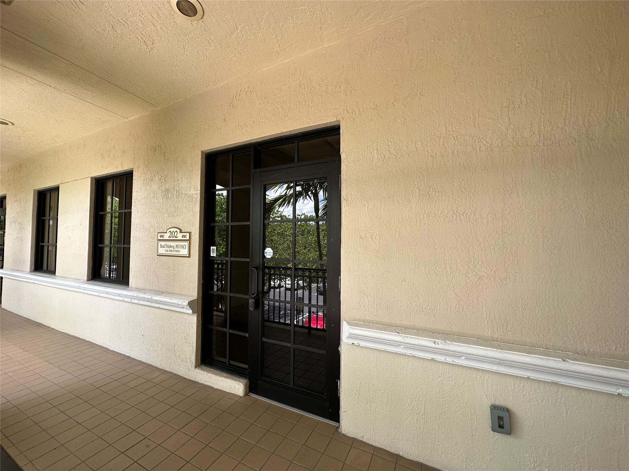 7451 Wiles Road 202 Property Photo 1