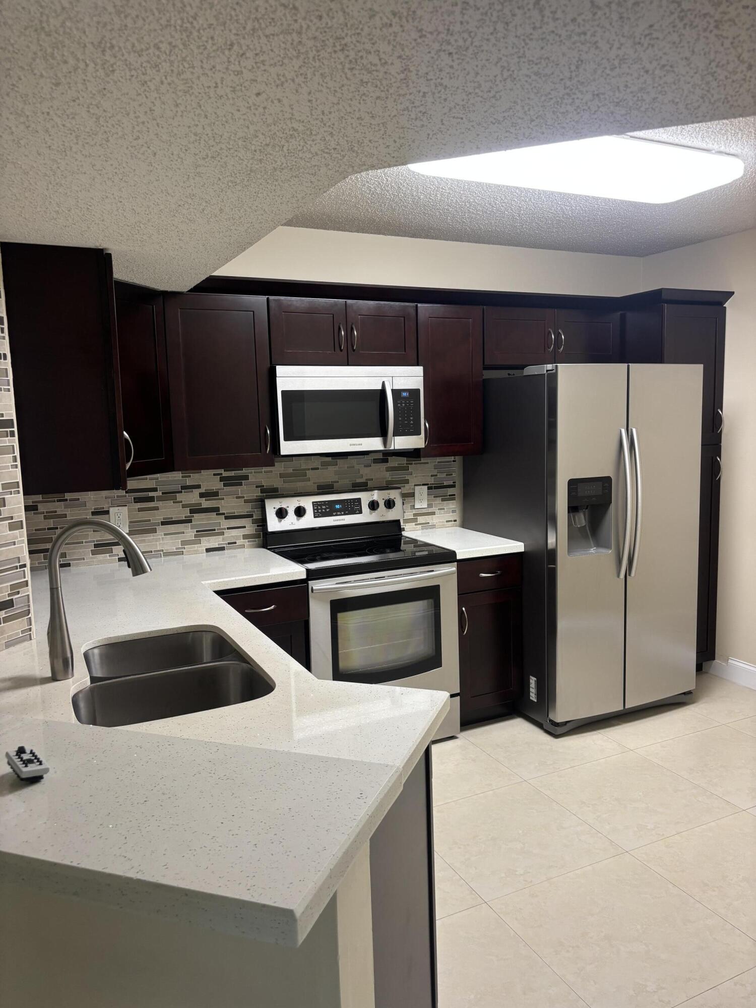 8761 WILES Road 304 Property Photo 1