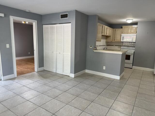 1865 Palm Cove Boulevard 9-106 Property Photo 1