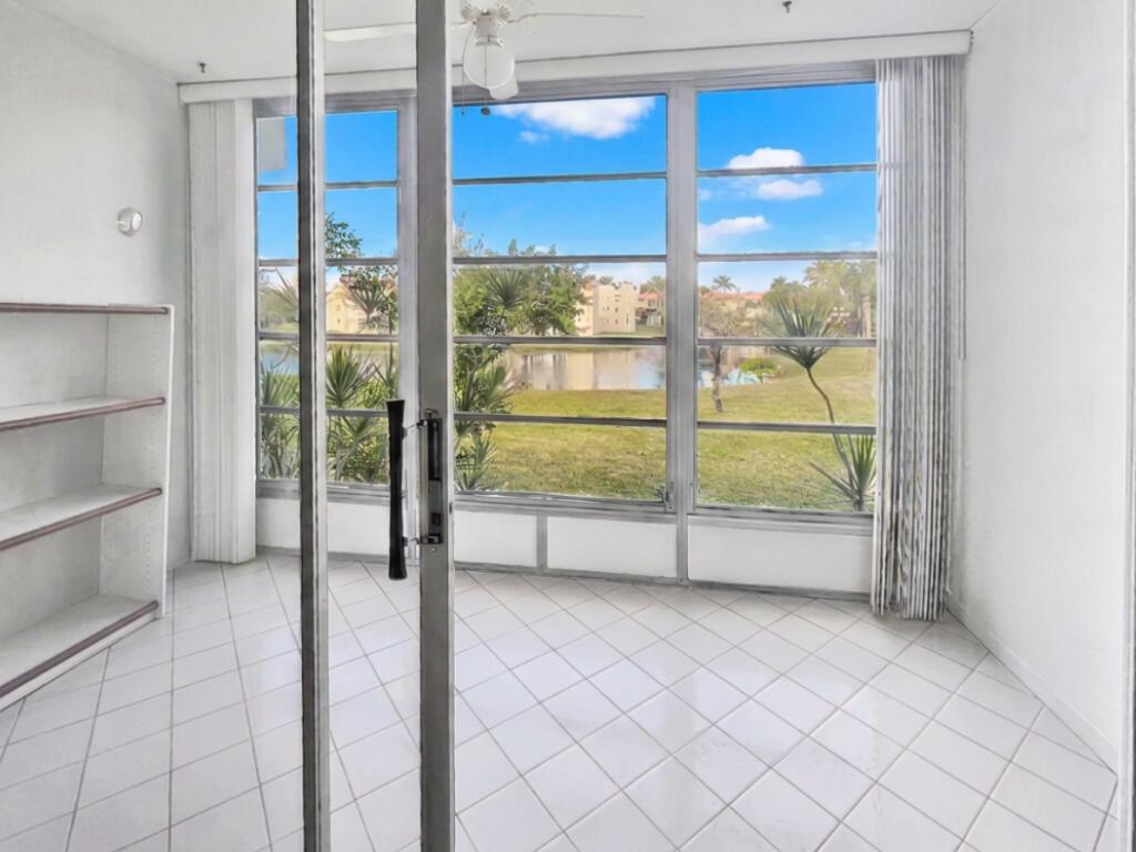 3051 Sunrise Lakes Drive E 203 Property Photo 1