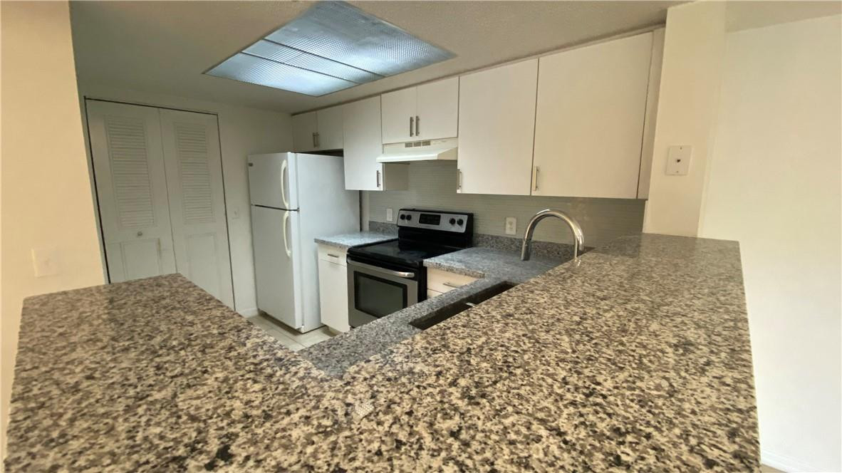 5045 Wiles Road 205 Property Photo 1