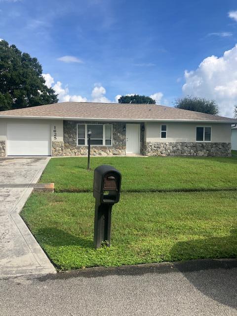 1625 SE GRAPELAND Avenue Property Photo 1