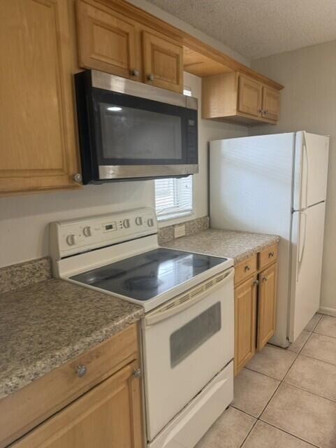 10143 TWIN LAKES Drive 2-J Property Photo 1