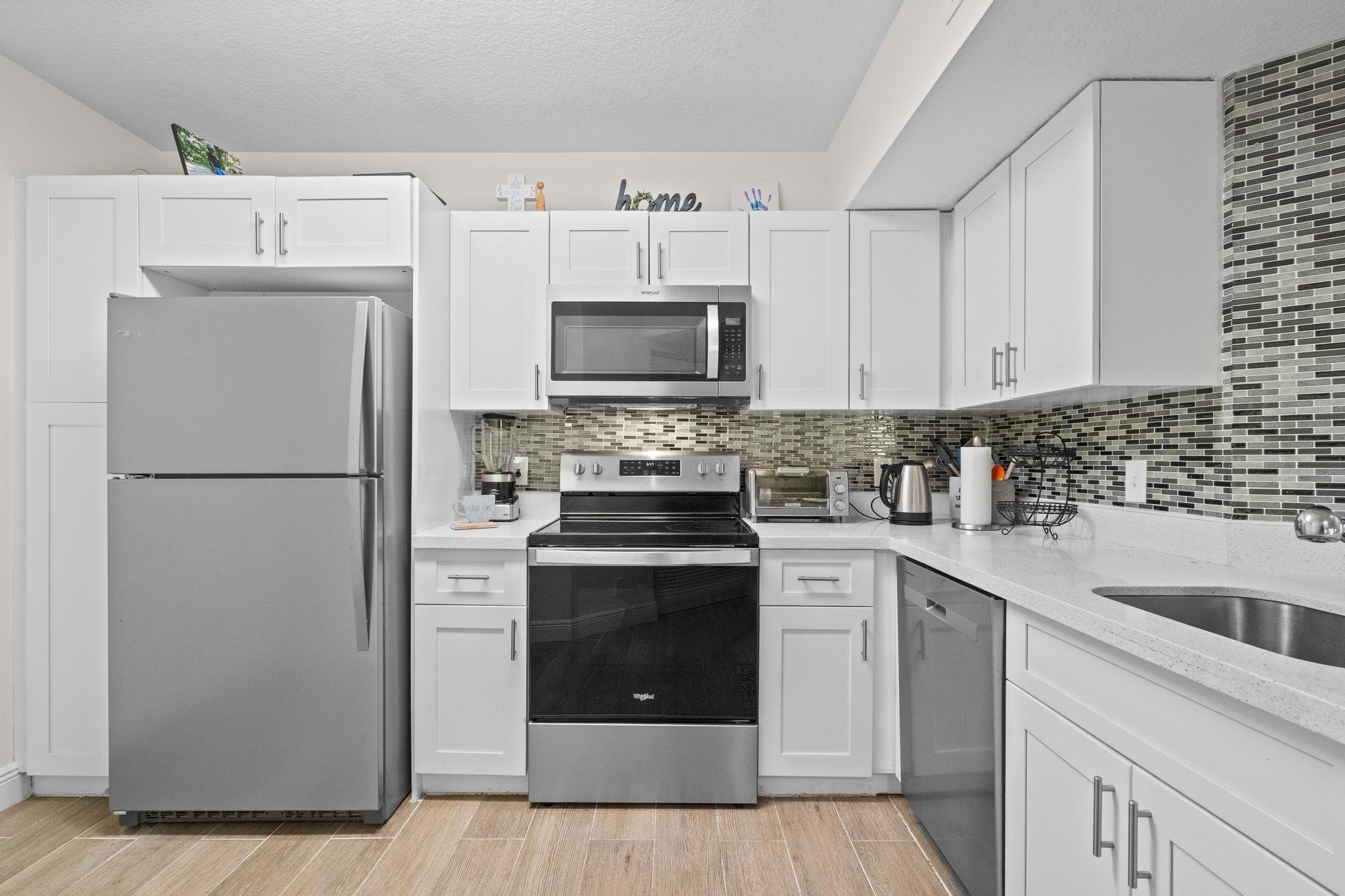 8851 Wiles Rd 305 Property Photo 1