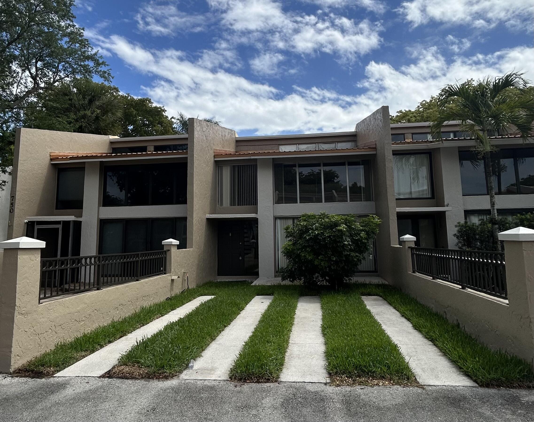 750 E Coco Plum Circle 2 Property Photo 1