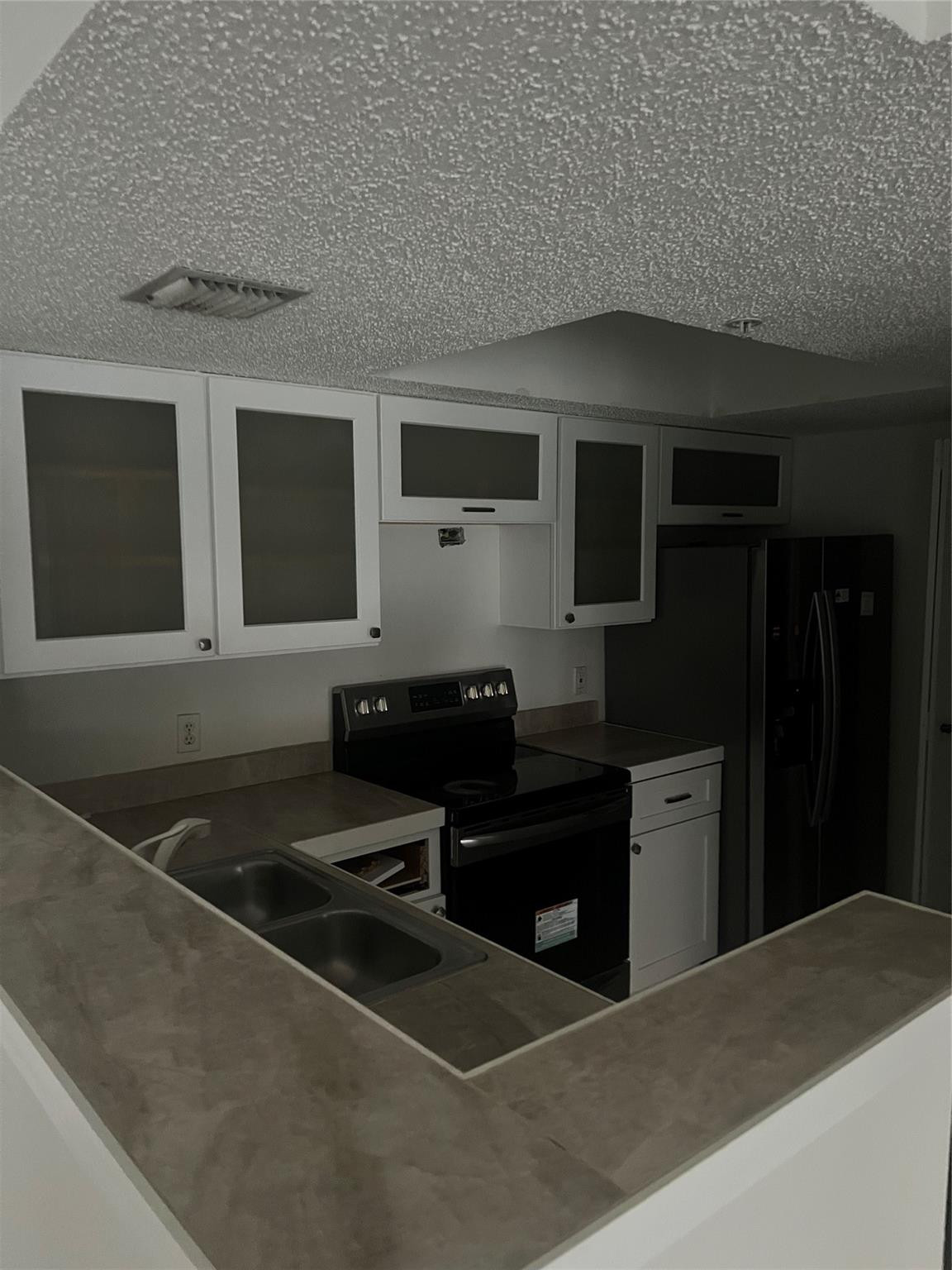 5031 Wiles Road 202 Property Photo 3