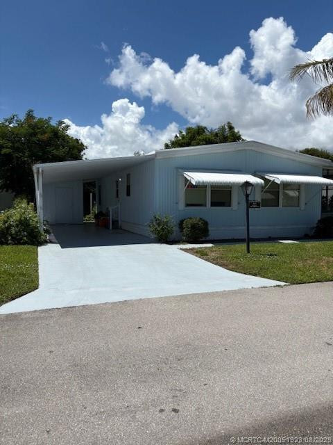 443 Ne Pinelake Village Boulevard Property Photo 1