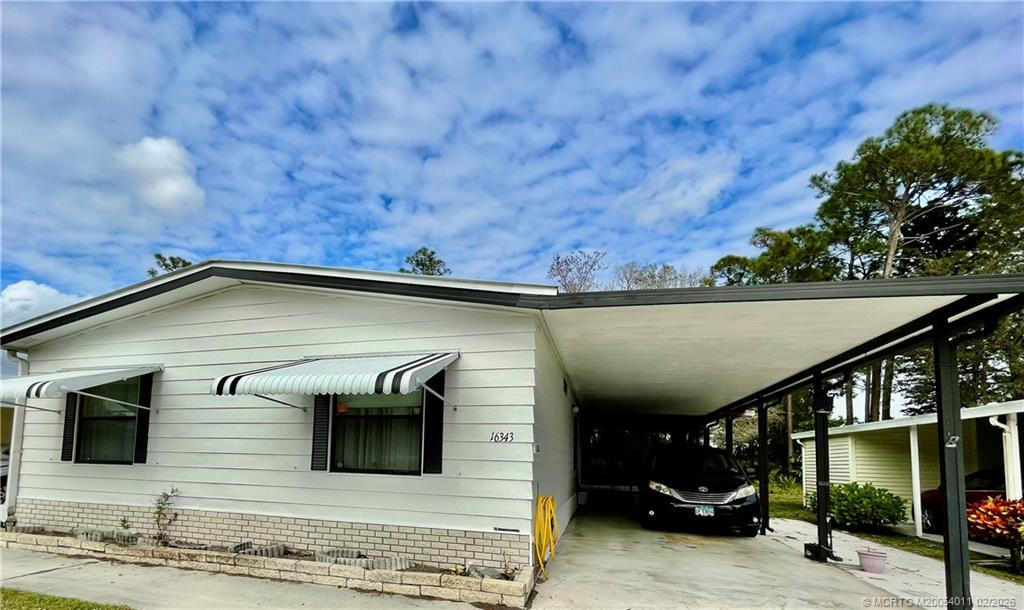 16343 Sw Four Wood Way Property Photo 1