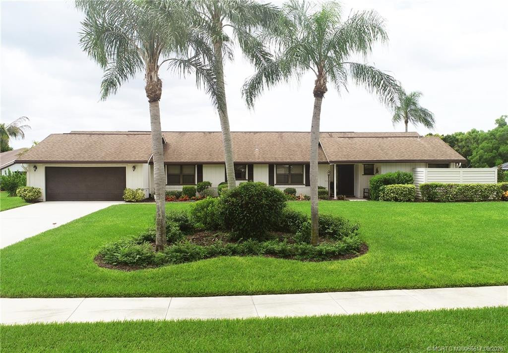 2490 Ne Pinecrest Lakes Boulevard Property Photo 1