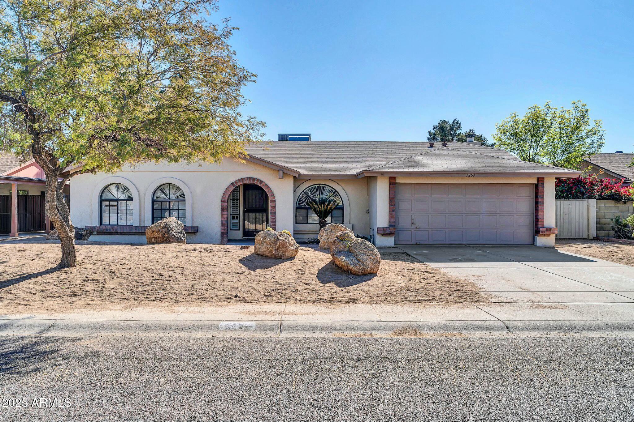 7357 W Canterbury Drive