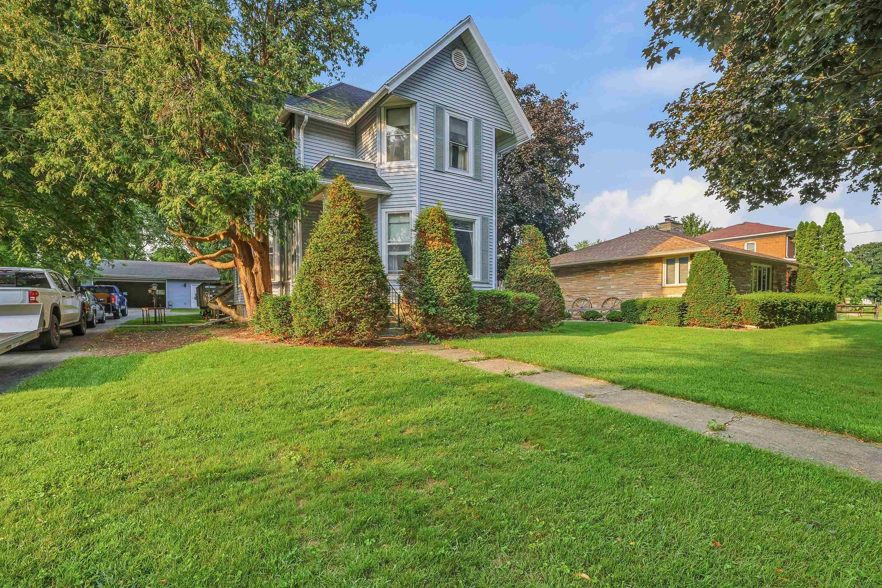 112 E WAUPUN Street