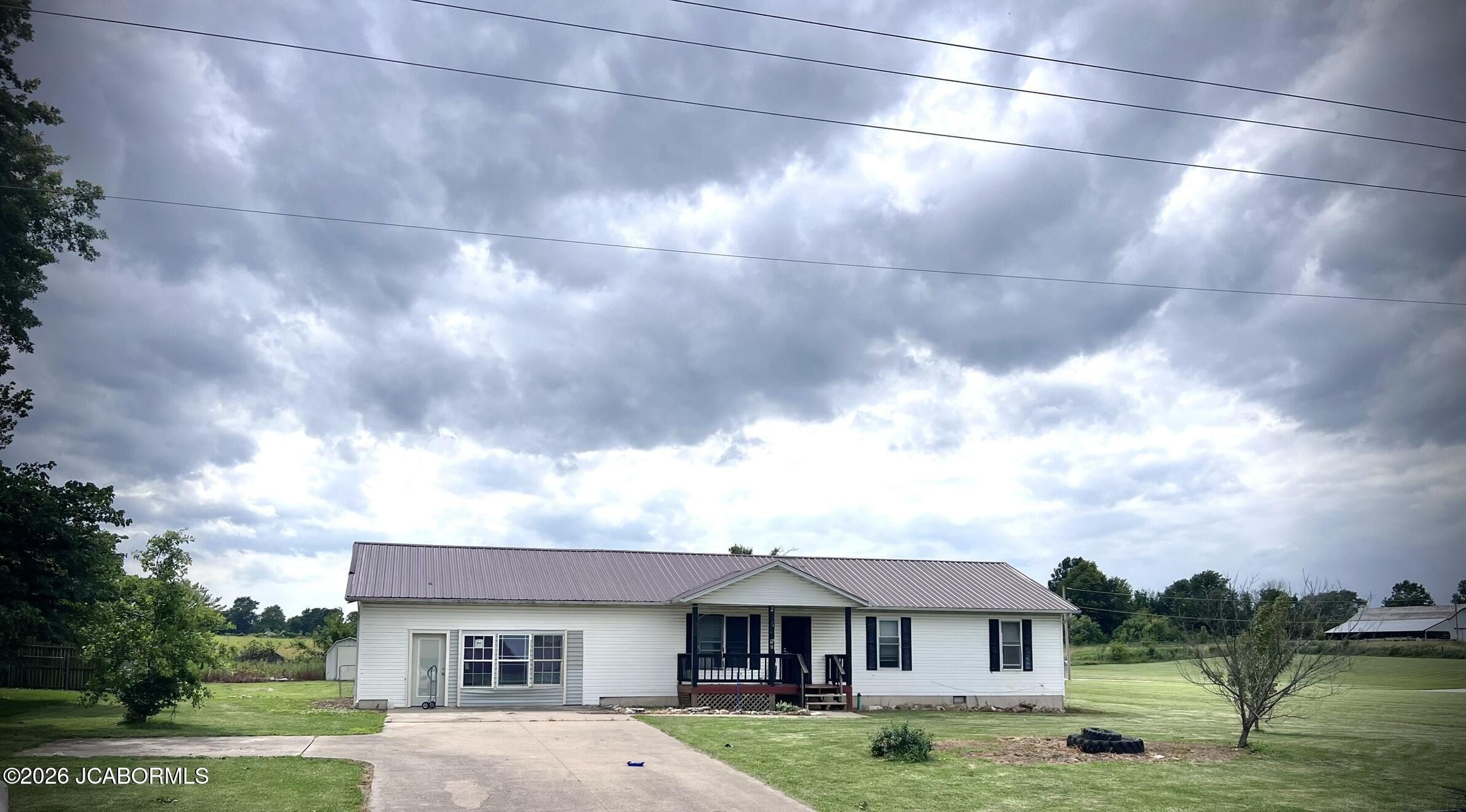 323 STATE ROAD AE Property Photo 1