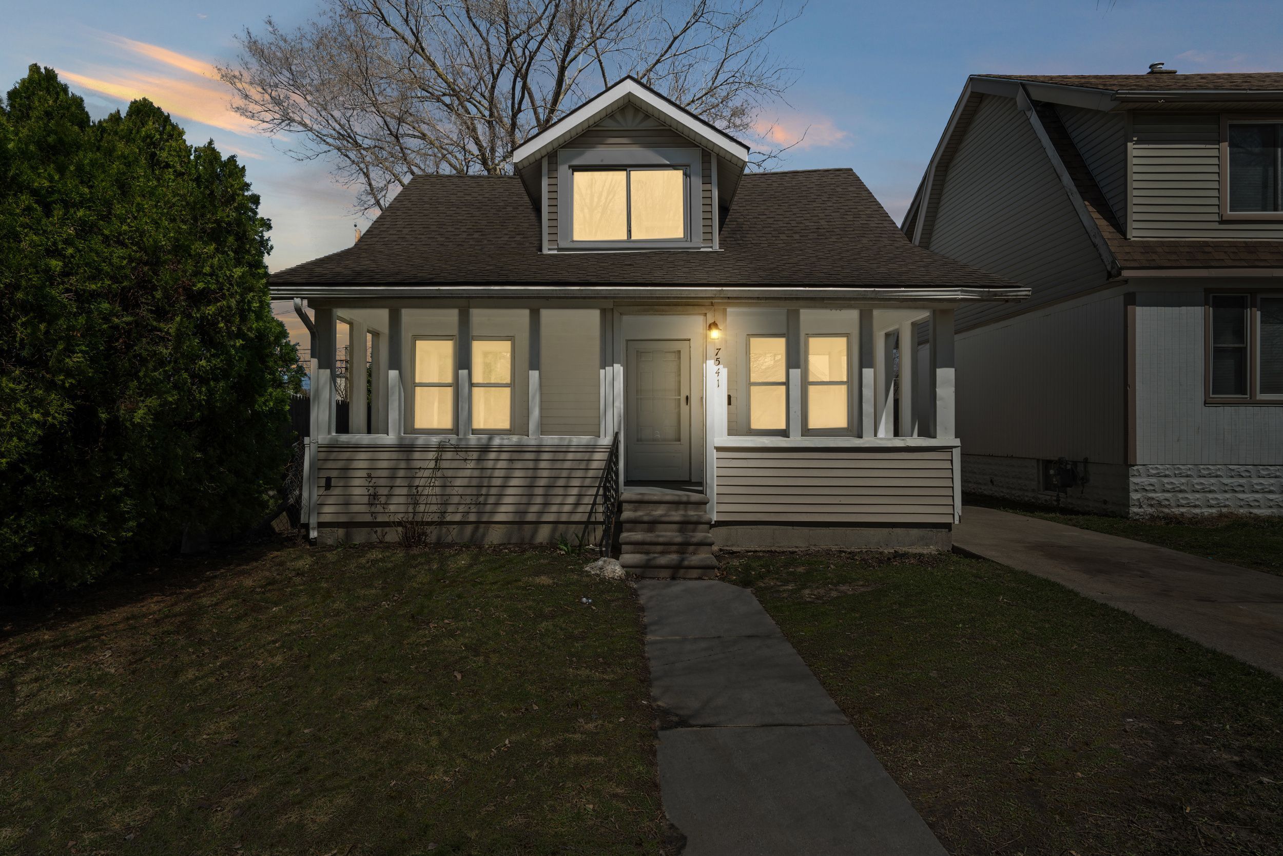 7541 ORCHARD AVE Property Photo 1
