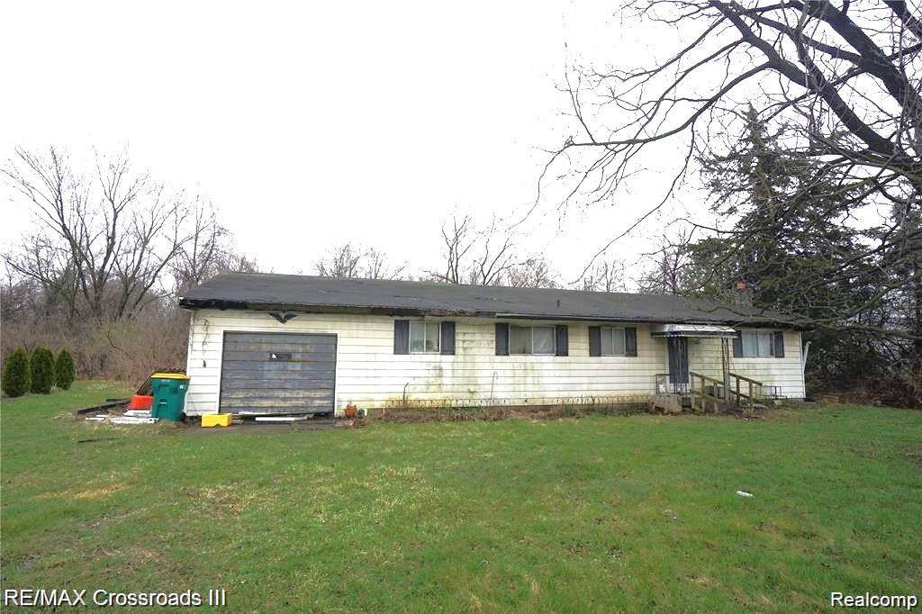7047 Haggerty Road Property Photo 1
