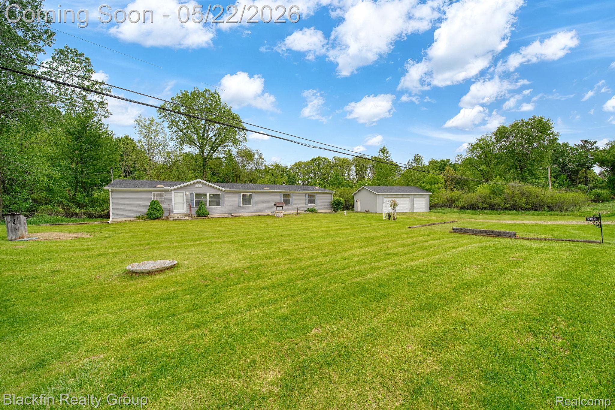 7001 Sweezy Lake Road Property Photo 1