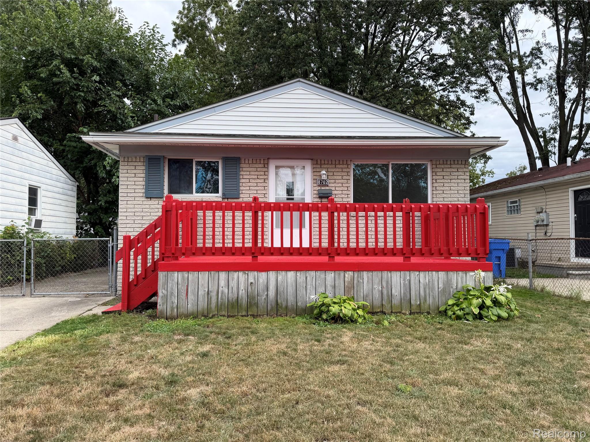 8702 CHALMERS Avenue Property Photo 1