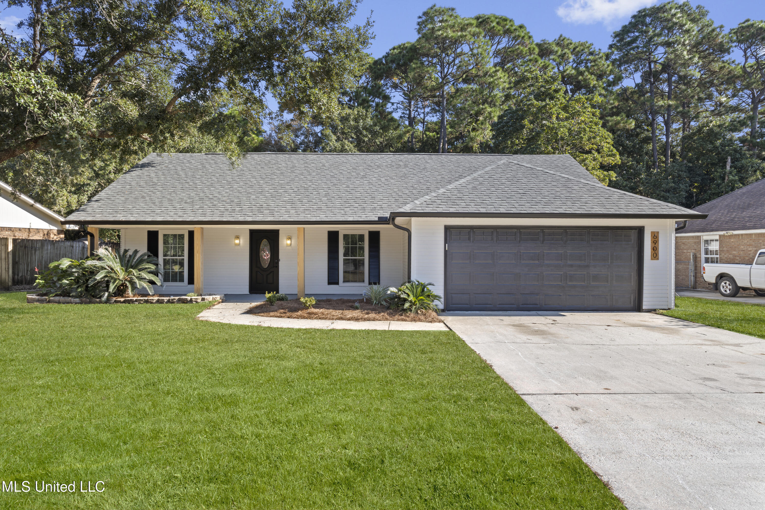 6900 Red Bud Lane Property Photo 1