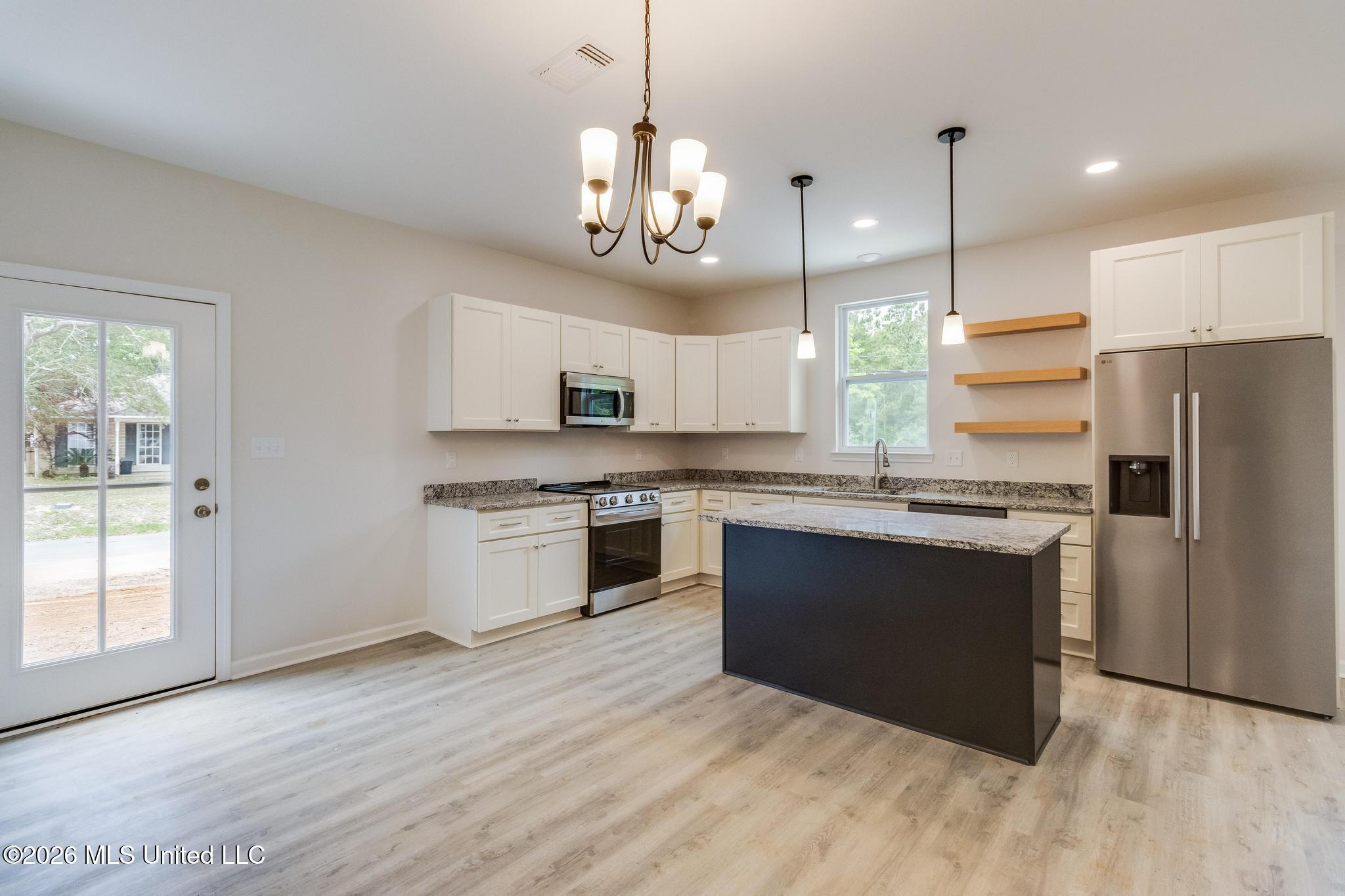 8713 Barnacle Boulevard Property Photo 5