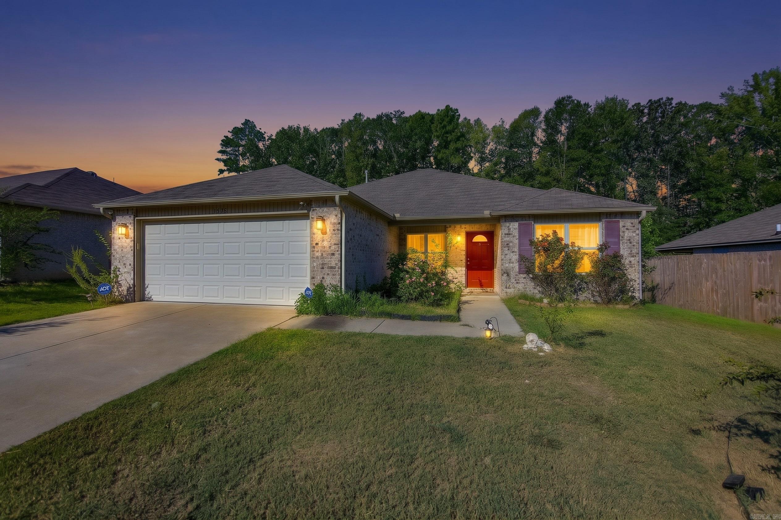 7130 Woodsgate Cove Property Photo 1
