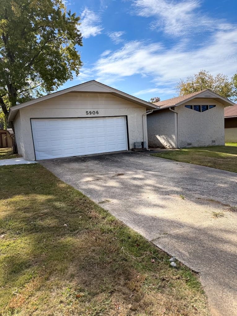 5906 Woodview Drive N Property Photo 1