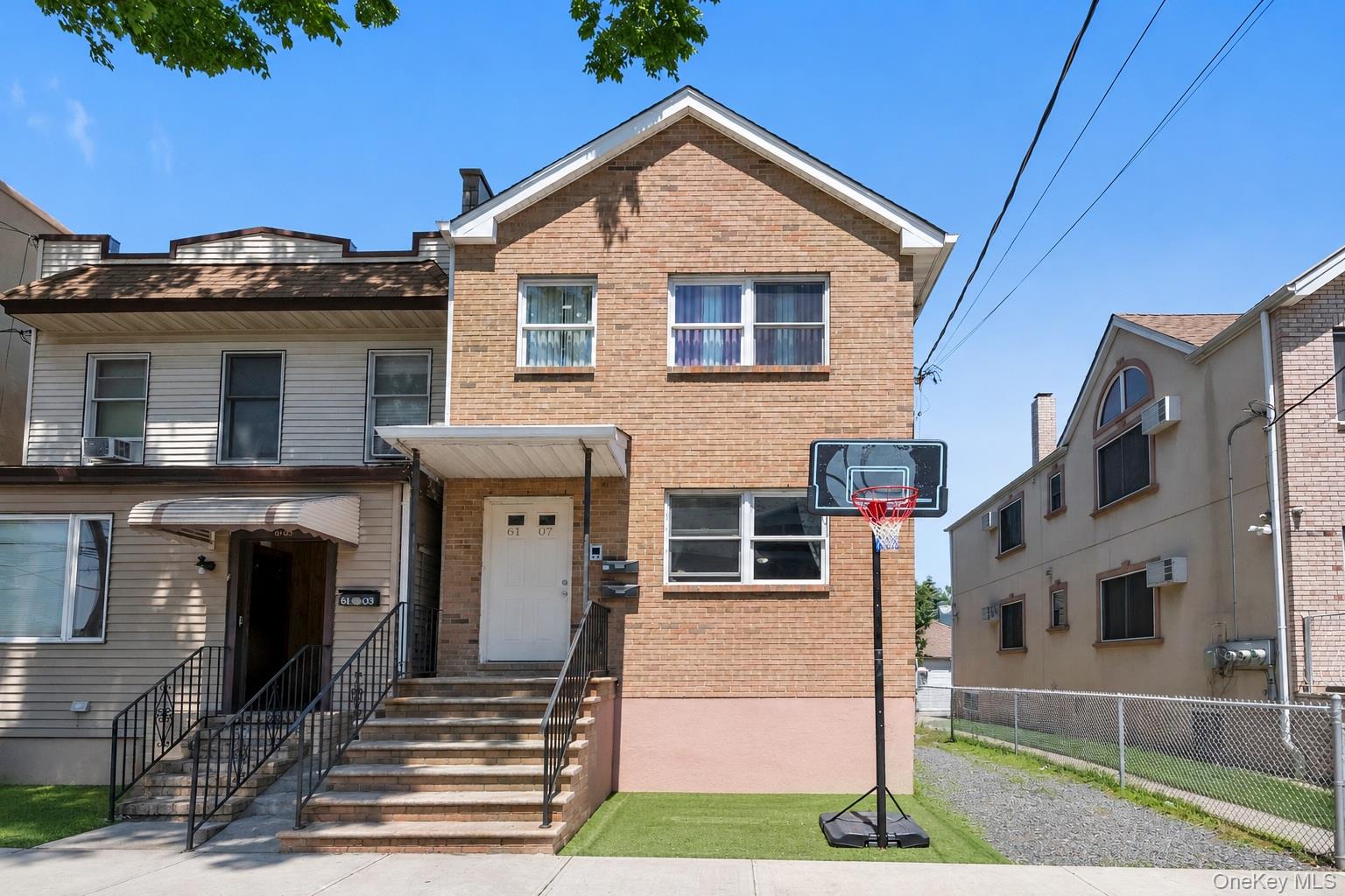 6107 Maspeth Avenue Property Photo 1