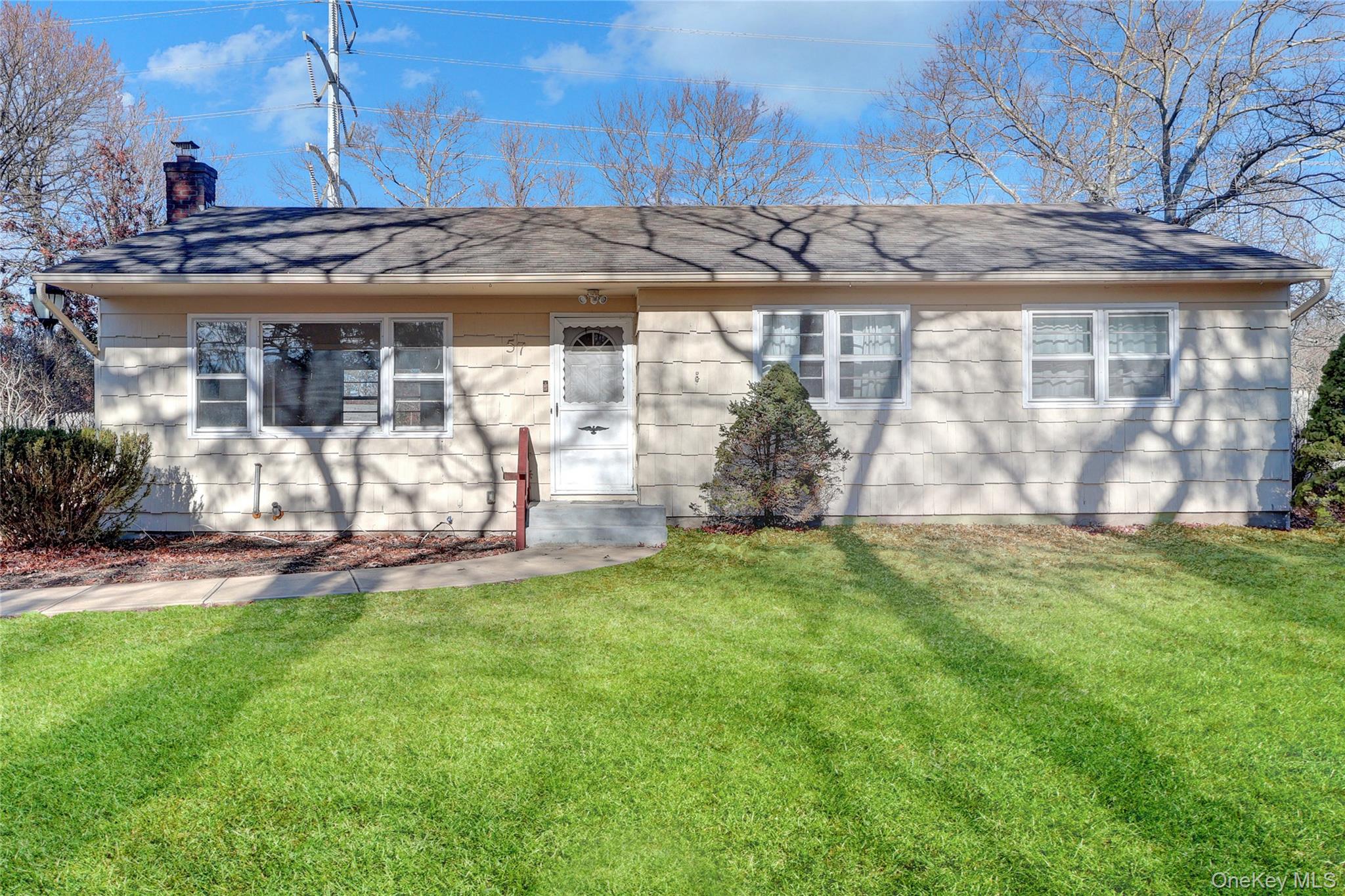 57 Middle Island Avenue Property Photo 1