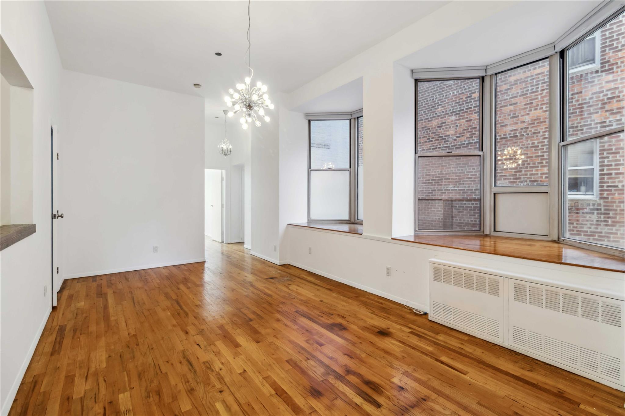 61-20 Woodside Avenue 2u Property Photo