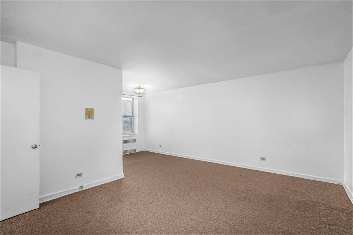 67-30 Clyde Street 7s Property Photo 3