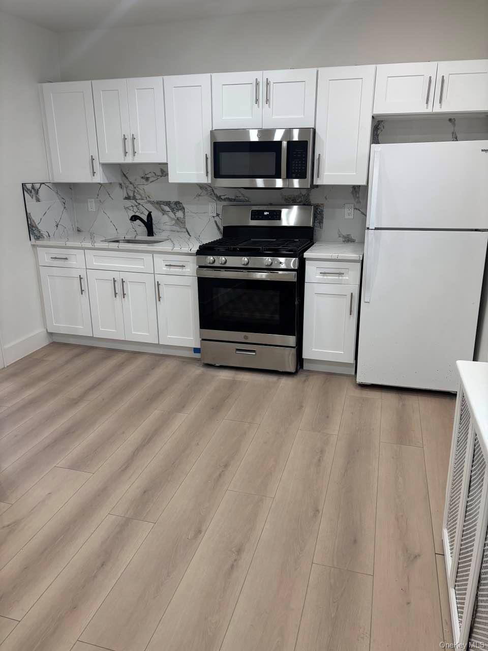 28 Walt Whitman Road Property Photo 5