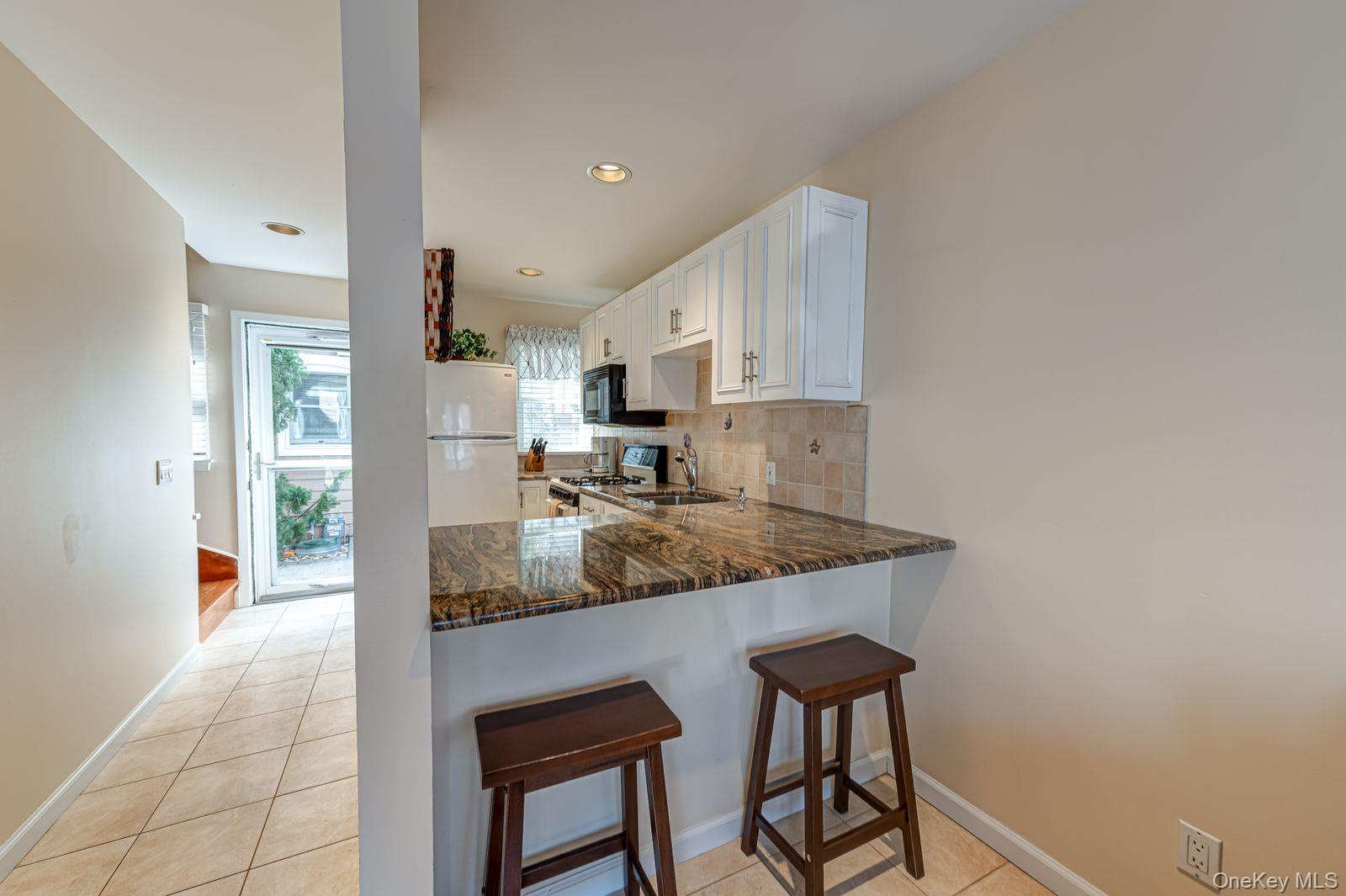 49 Canoe Place Road 212 Property Photo 5