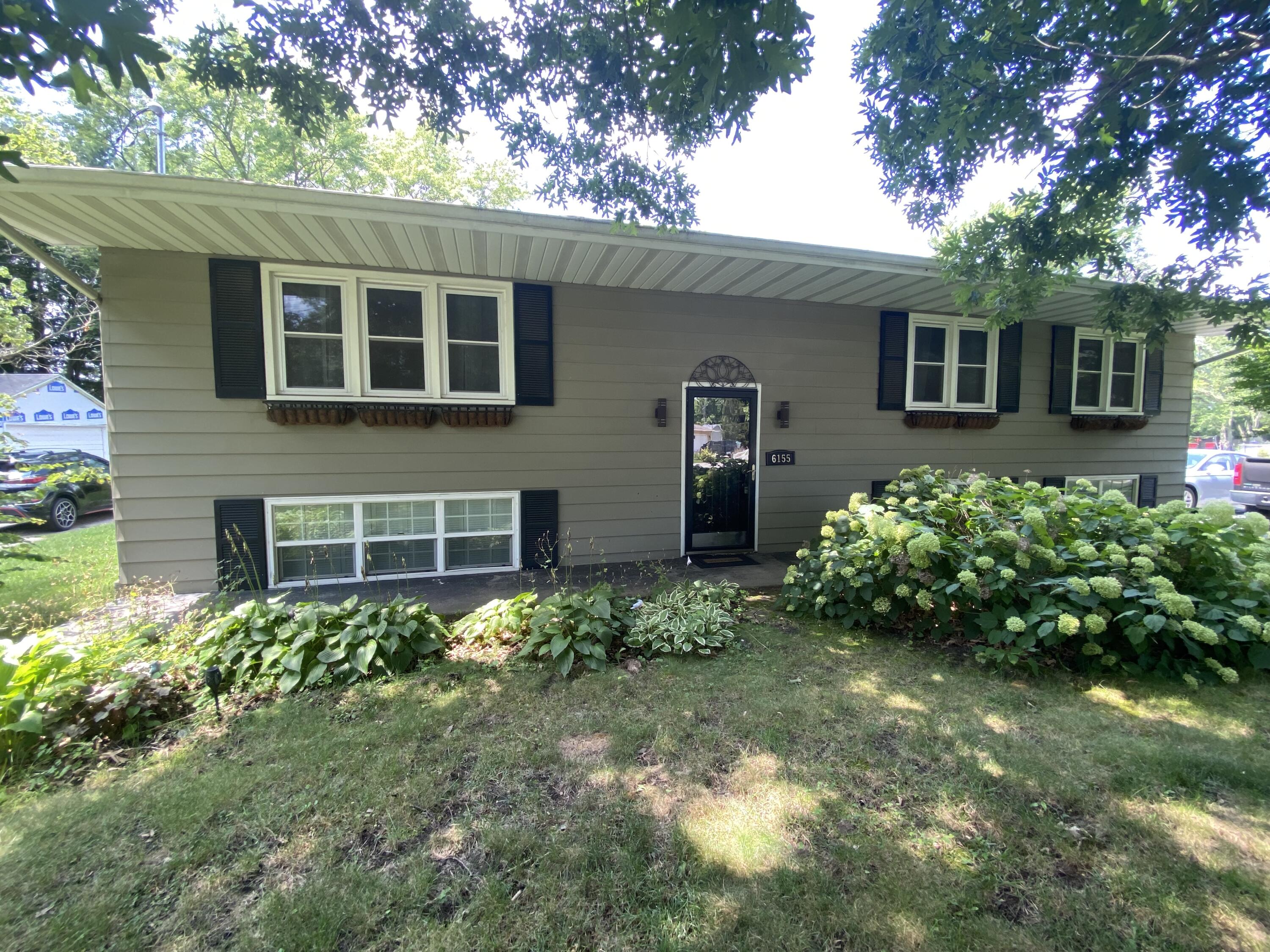6155 S John Street Property Photo 1
