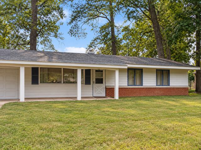 6313 Wea Woodland Drive Property Photo 1
