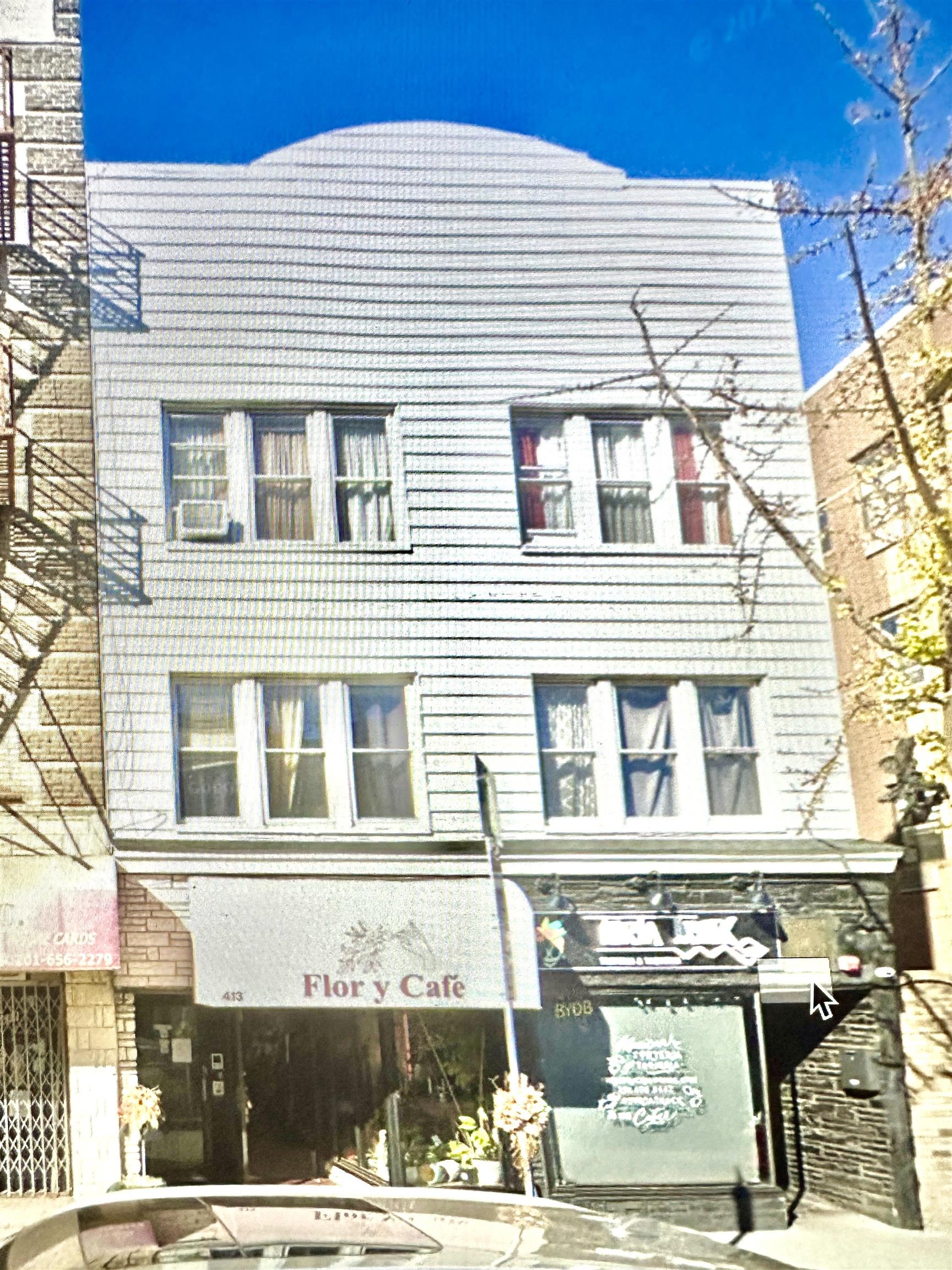 413 CENTRAL AVE Left Side Store Property Photo 1