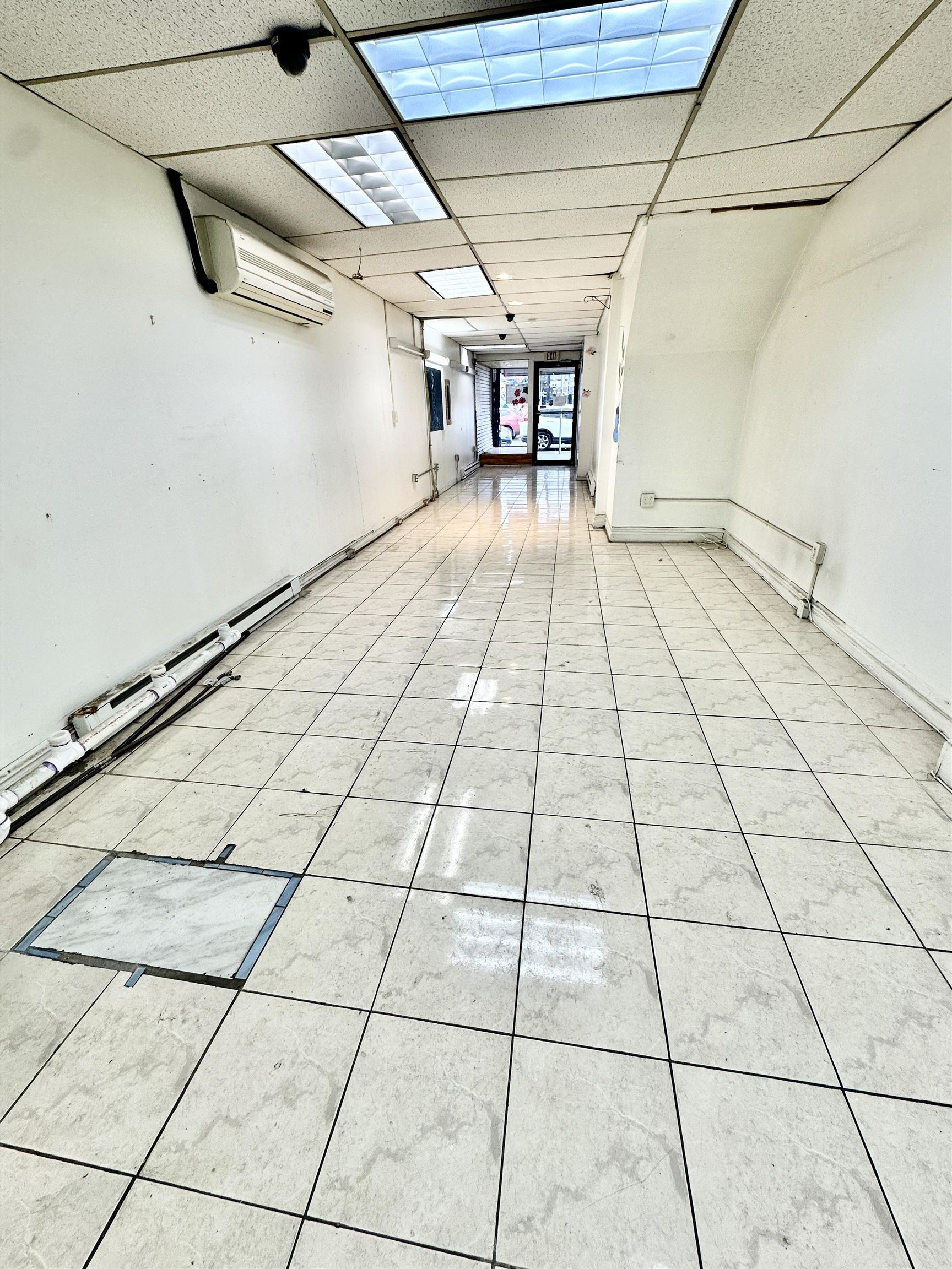 413 Central Ave Left Side Store Property Photo 3