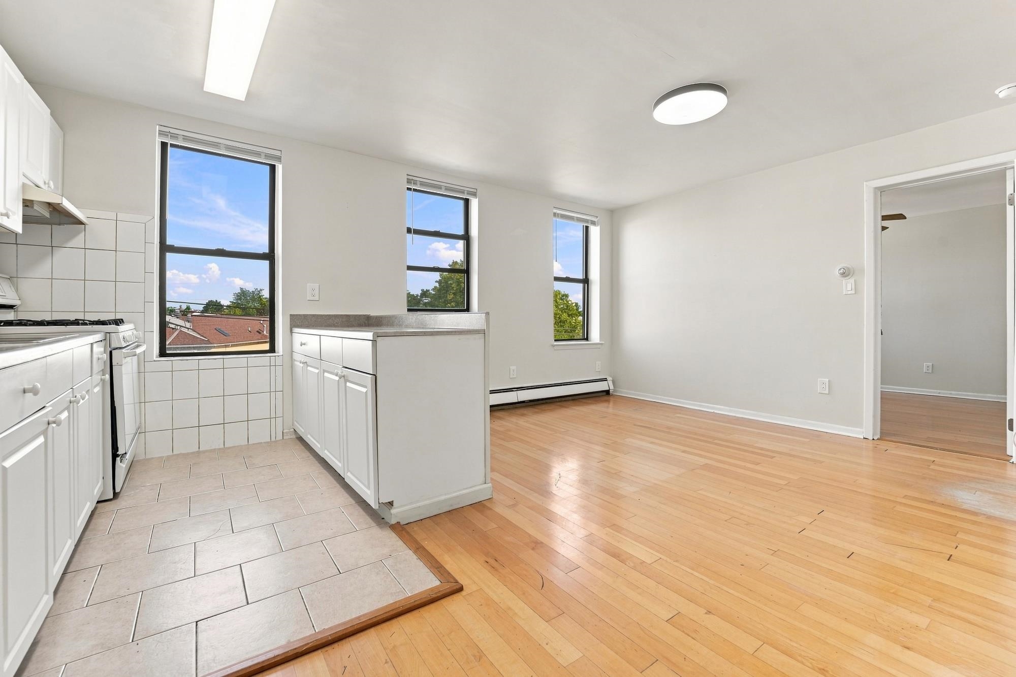 1677 KENNEDY BLVD 13 Property Photo 1
