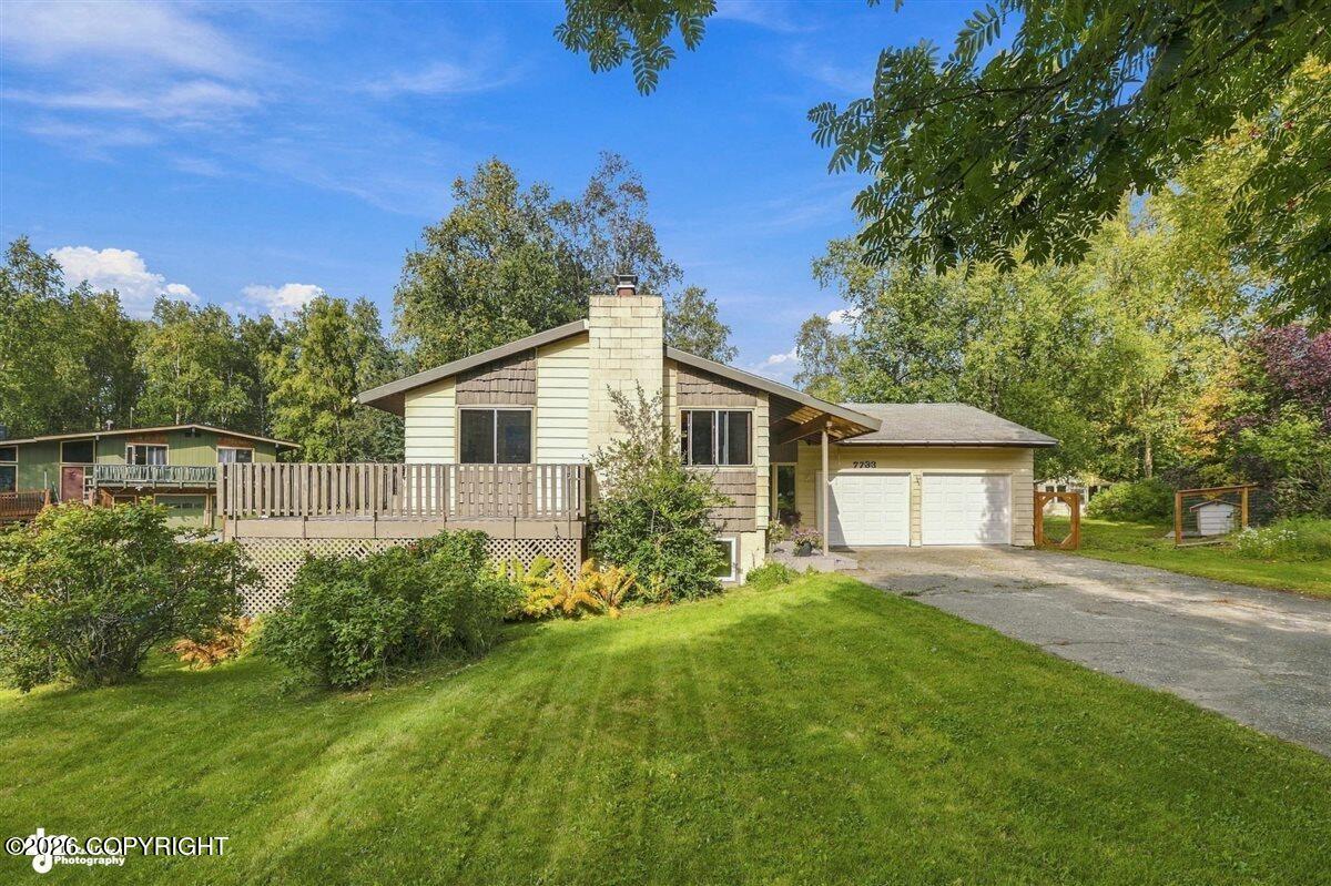 7733 Honeysuckle Drive Property Photo 1