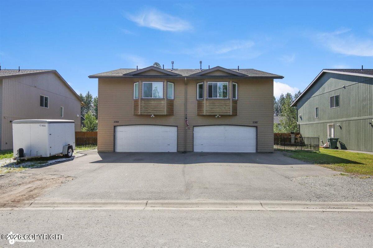 2382 & 2384 E 64th Avenue Property Photo 1
