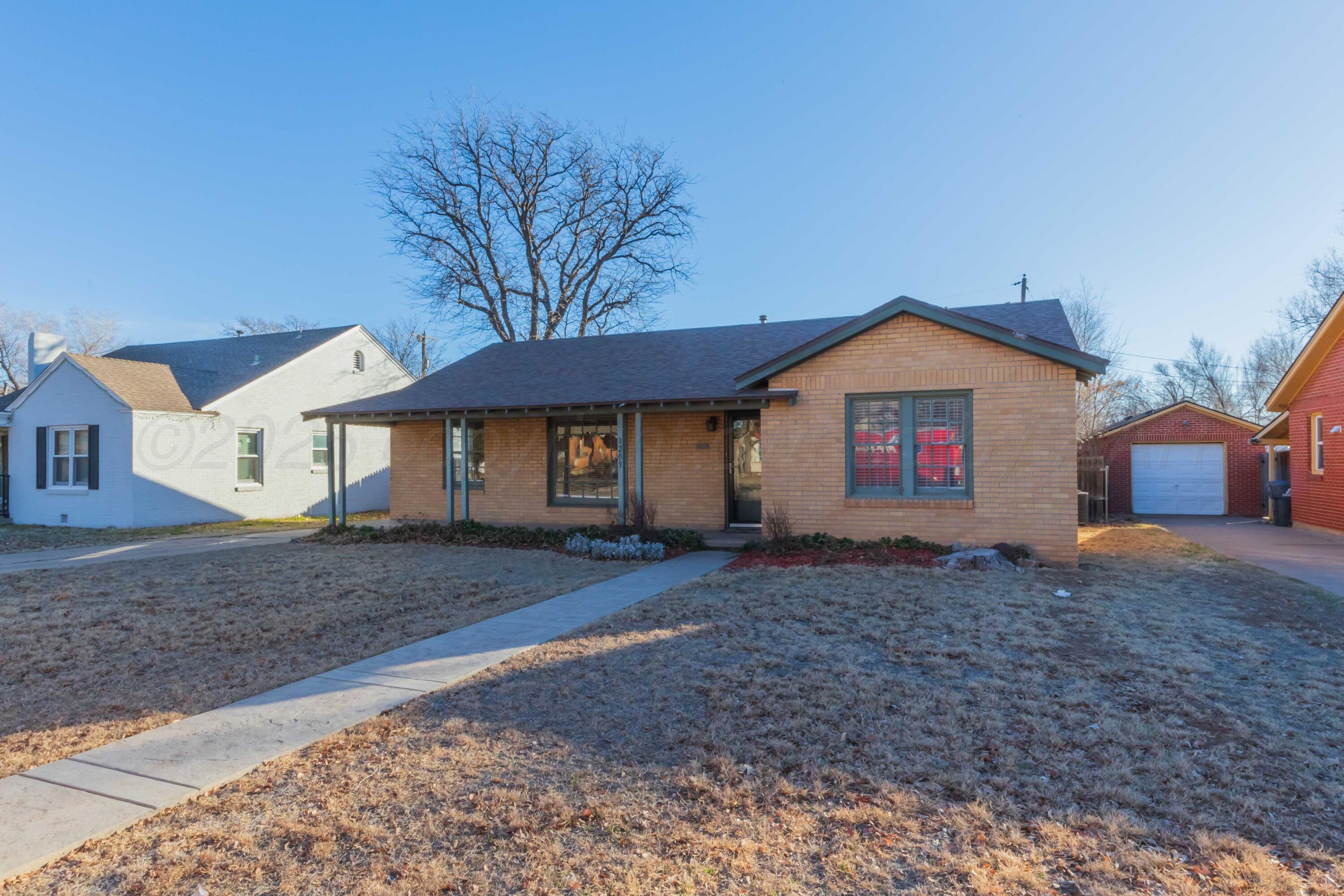1209 S TRAVIS Street Property Photo 1