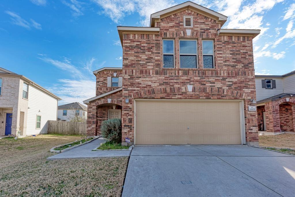 6609 Garden Rose Path Property Photo 1