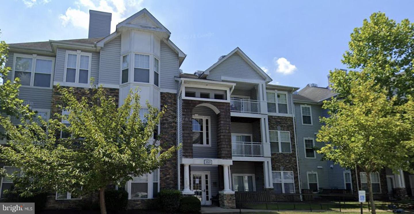 3521 PINEY WOODS PL #F203 Property Photo 1