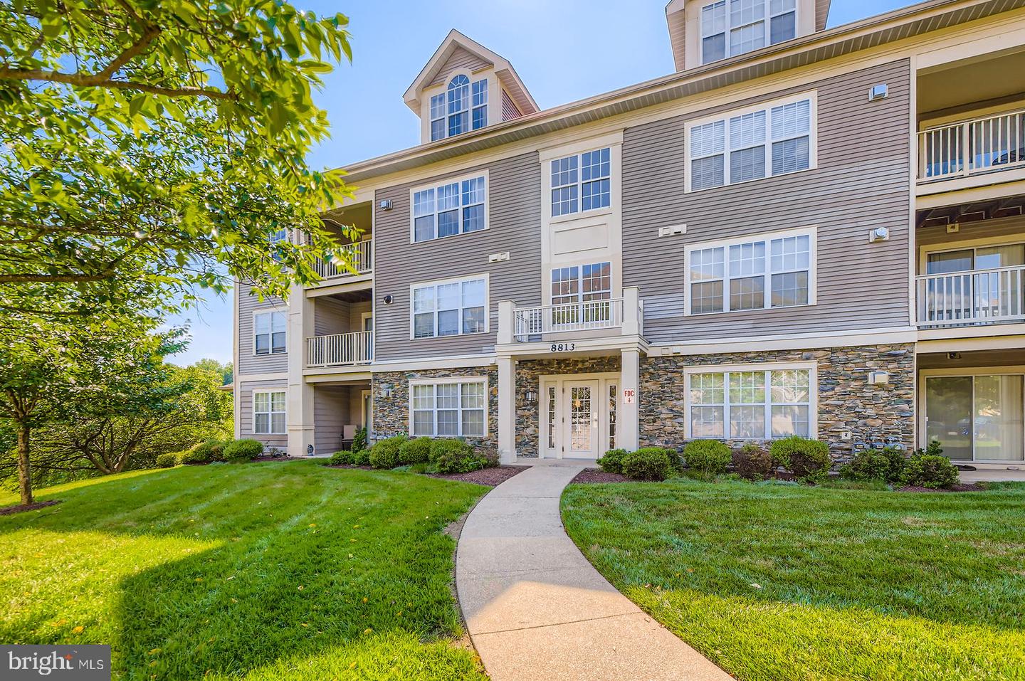 8813 STONE RIDGE CIR #203 Property Photo 1
