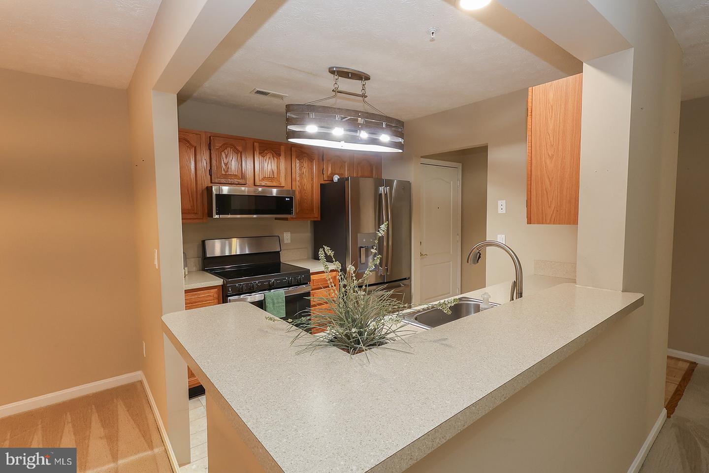 23140 COBBLESTONE LN #110 Property Photo 1