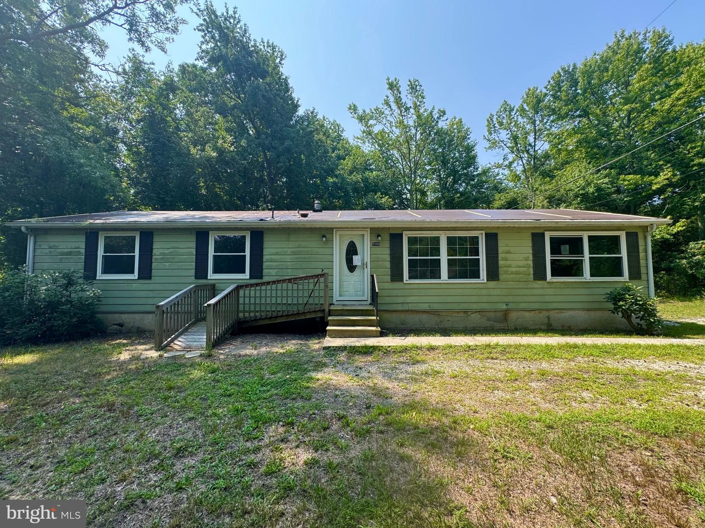 7089 James Moore Rd Property Photo 1