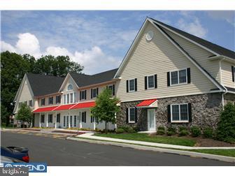 115 PHEASANT RUN #SUITE 218 Property Photo 1